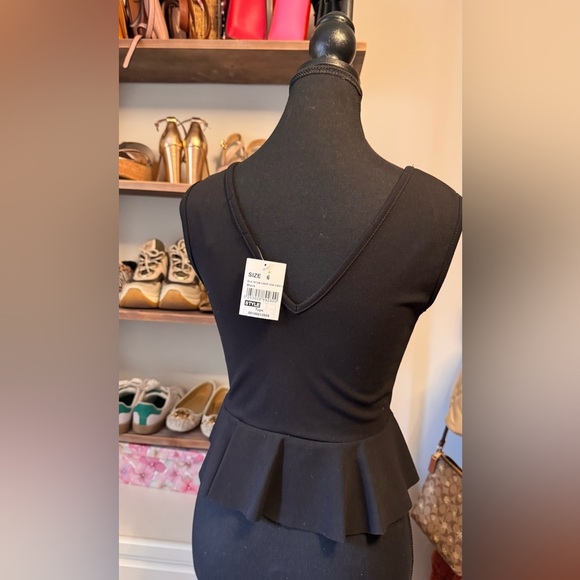 Elegant Black Peplum Dress - Picture 3 of 4